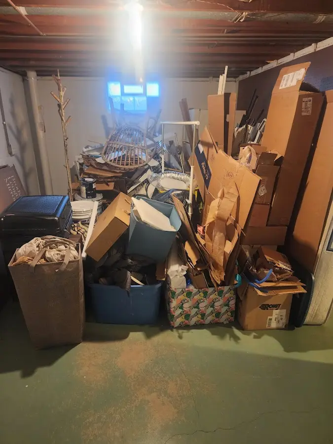 Roll-off dumpster container at job site for 4 Yard Dumpster Rental in Wellsville